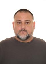 Foto oficial de Policial Minetti no TSE